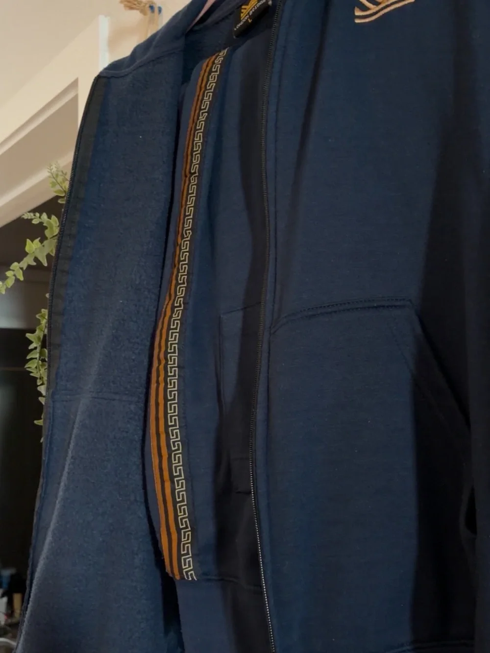 Navy Zip-Up Hoodie with Embroidered Gold Logo
